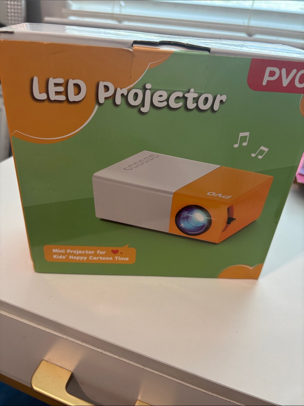 Portable LED Mini Projector - White and Orange Kids Projector